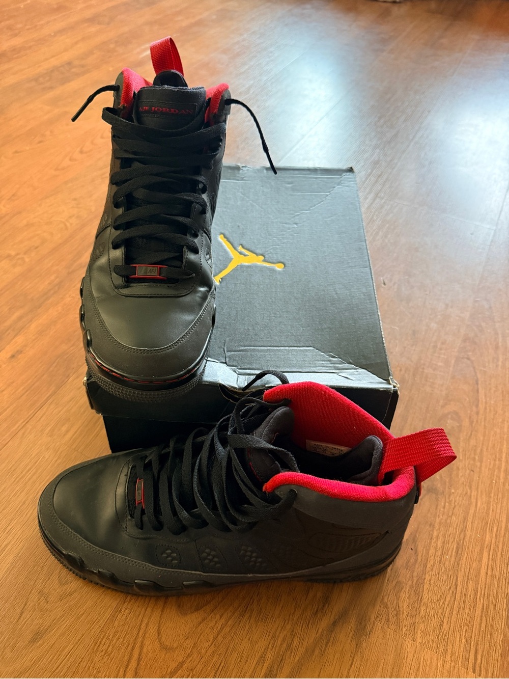 Jordan High-Top Sneakers in Black with Red Accents